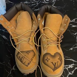 Tim boots painted Louis Vuitton on sides and front